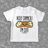 White cute toddler shirt saying "Holi cannoli, I'm cute". 