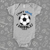  Cool baby onesies with saying "I Don't Drool, I Dribble!" in grey. 
