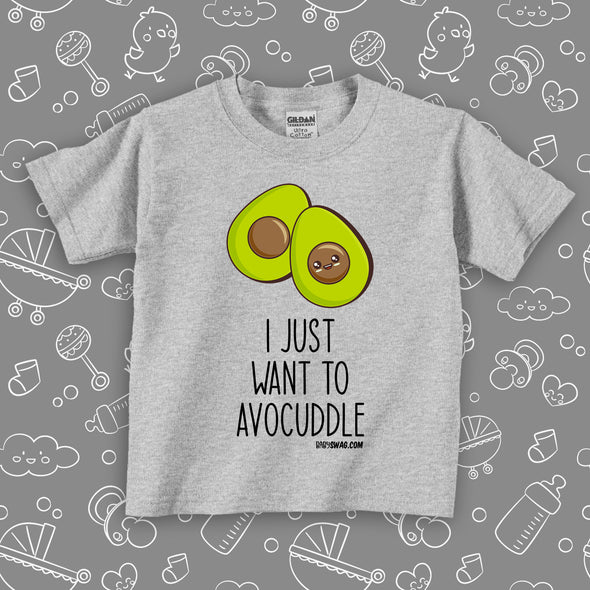 Toddler graphic tees with saying "I Just Want To Avocaddle" in grey. 