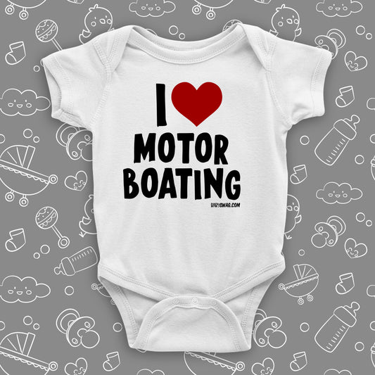 The ''I Love Motor Boating'' swag baby clothes in white. 