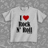 Toddler shirts with saying "I Love Rock And Roll" in grey. 