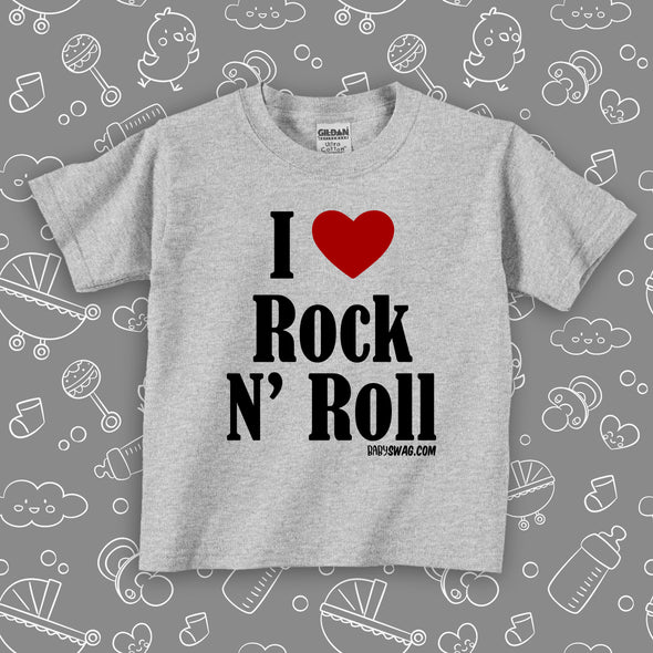 Toddler shirts with saying "I Love Rock And Roll" in grey. 