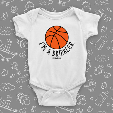 Baby boy onesies with saying "I'm A Dribbler" in white.