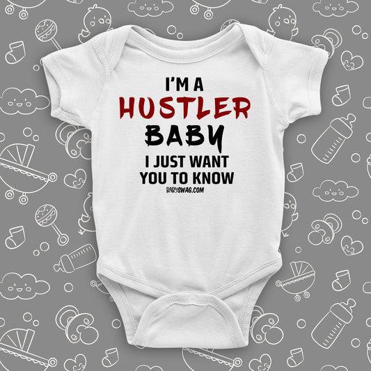 Funny baby onesies with saying "I'm A Hustler Baby" in white.