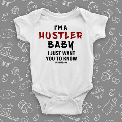 Funny baby onesies with saying "I'm A Hustler Baby" in white. 