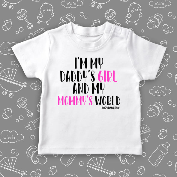 White toddler girl shirt with saying "I'm My Daddy's Girl And My Mommy's World". 