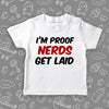 Funny toddler shirt with saying "I'm Proof Nerds Get Laid" in white.