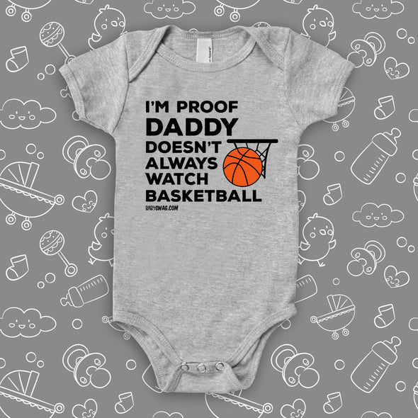 Hilarious baby onesies with saying "I'm Proof That Daddy Doesn't Always Watch Basketball" in grey.
