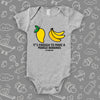 Hilarious baby onesie with "It's Enough To Make A Mango Bananas" print, in grey. 