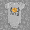 Cute baby boy onesie with saying "It's In My DNA" in grey. 