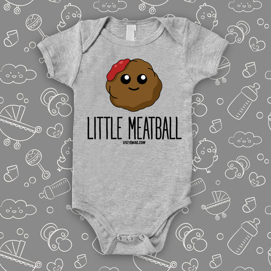 Graphic baby onesie saying "Little Meatball" in color grey.