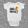 The ''Little Nugget'' cute baby onesie in white.