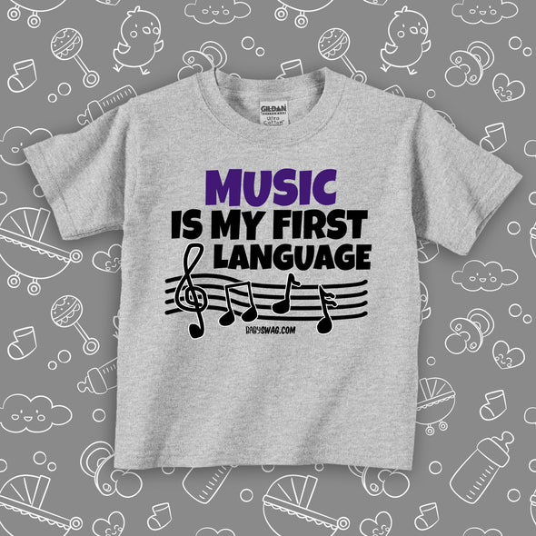 Grey toddler graphic tee with saying "Music Is My First Language" 