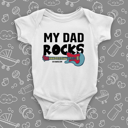 Cool baby onesies with saying "My Dad Rocks" in white.