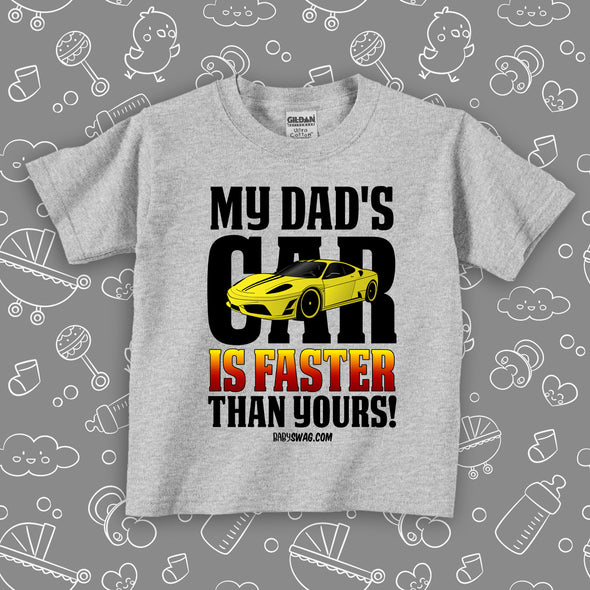 Toddler graphic tee with saying "My Dad's Car Is Faster Than Yours!" in grey.  