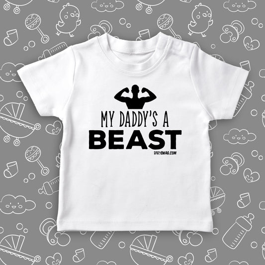  Cute toddler shirt with saying "My Daddy's A Beast" in white. 