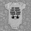 Funny infant onesie with saying "My Mom Can Squat More Than Your Mom" in grey.