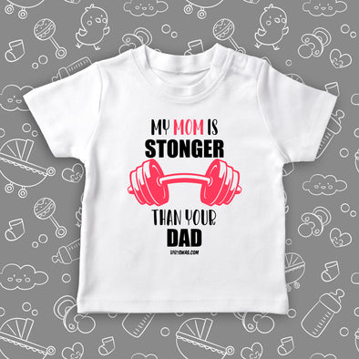 Toddler shirt with saying "My Mom Is Stronger Than Your Dad" in white.