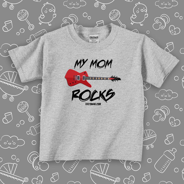 Cute toddler shirt with saying "My Mom Rocks" in grey. 