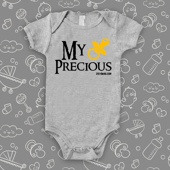 The "My Precious" baby onesies in grey.