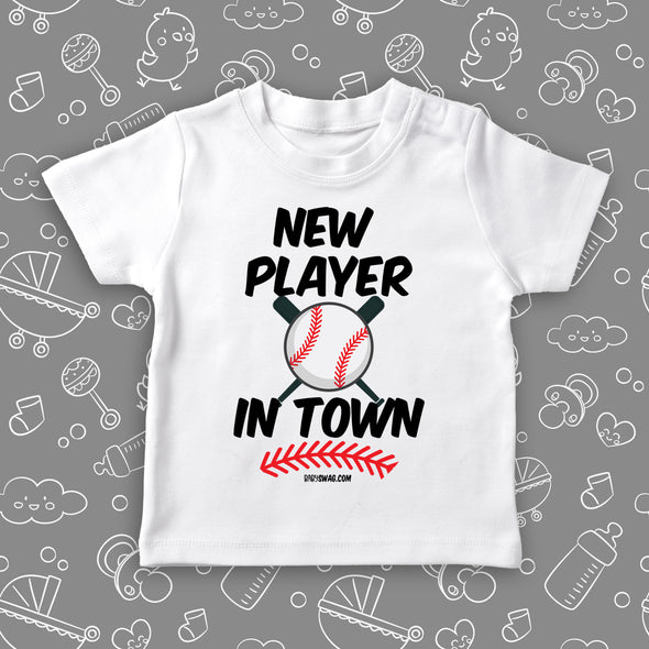 Cute toddler shirt with saying " New Player In Town" in white.