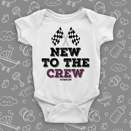 A white baby boy onesie with "New To The Crew" print.