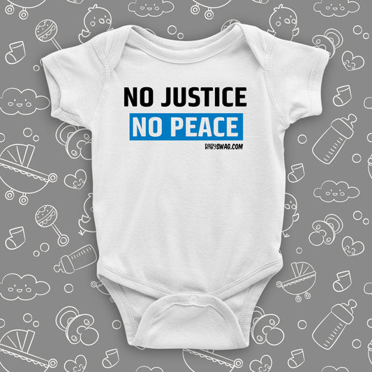 White baby onesie with "No justice, no peace" print.