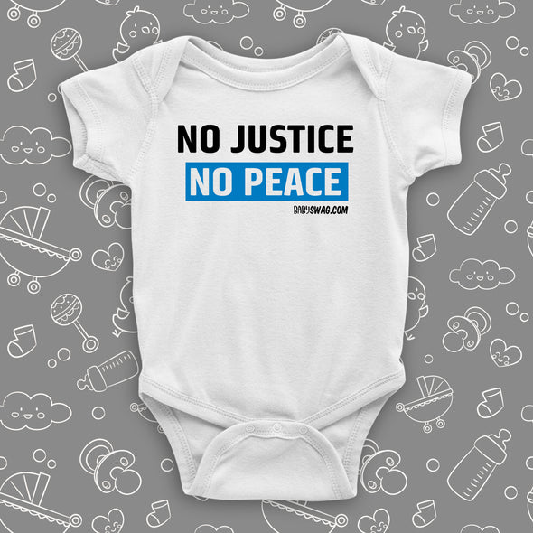 White baby onesie with "No justice, no peace" print.