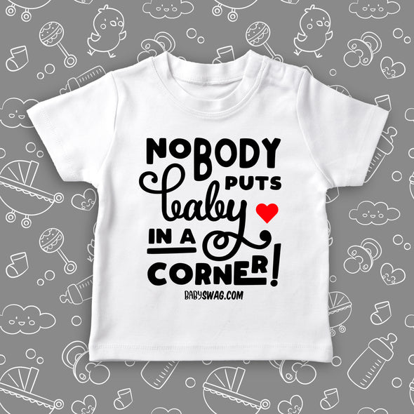Toddler shirt with saying "Nobody Puts Baby In A Corner! " in white. 