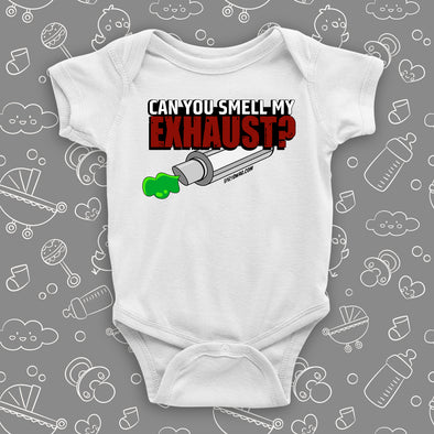 A white hilarious baby onesies saying "Can You Smell My Exhaust".