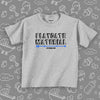 Todder shirt with caption "Playdate Material" in grey. 