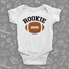 The "Rookie" unique baby onesies in white.