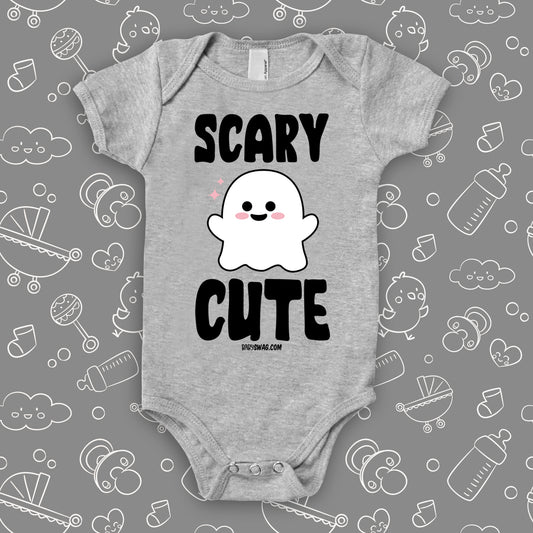 Baby girl onesies with saying "Scary Cute" in grey.