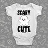 Baby girl onesies with saying "Scary cute" in white