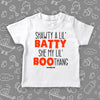 Toddler shirt with saying "Shawty A Lil' Batty, She My Lil" Boo-thang" in white. 