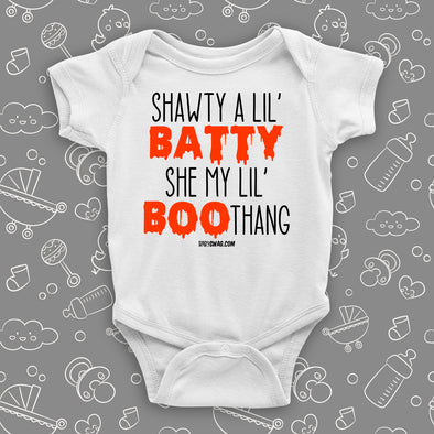 Cute baby onesies with saying "Shawty A Lil' Batty, She My Lil' Boo-thang" in white.