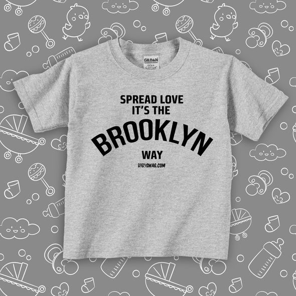 Cute toddler shirt with saying "Spread Love, It's The Brooklyn Way" in grey. 