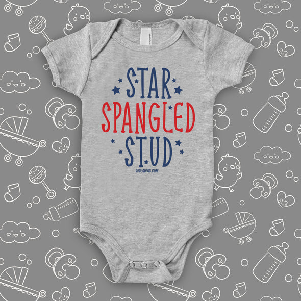The unique baby boy onesies with the caption "Star Spangled Stud" in grey. 