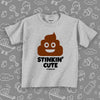  Funny toddler graphic tee with saying "Stinkin' Cute" in grey. 