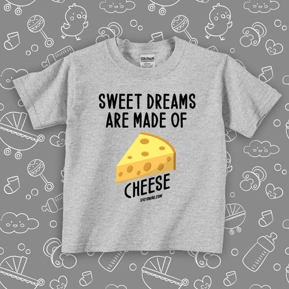Funny toddler graphic tees with saying "Sweet Dreams Are Made Of Cheese" with an image of cheese in grey.