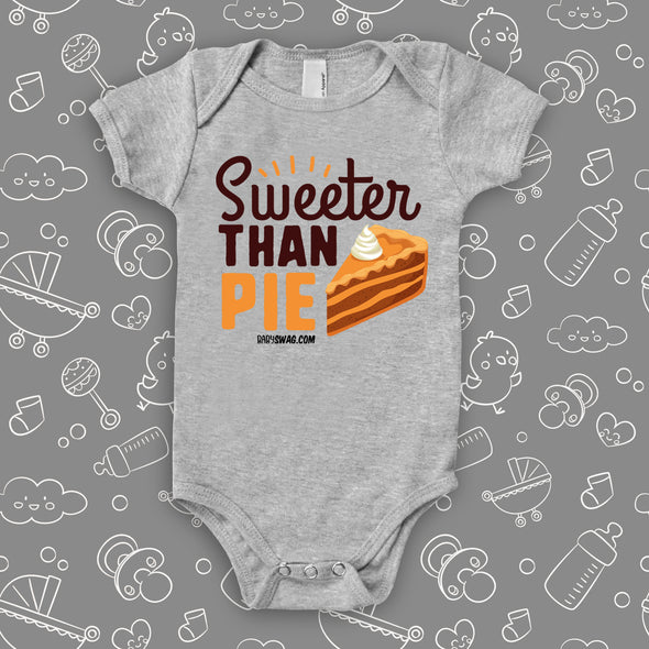 Cute baby onesies with saying "Sweeter Than Pie" in grey.