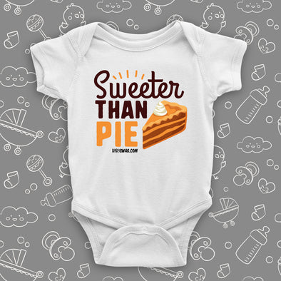 Cute baby onesies with saying "Sweeter Than Pie" in white.