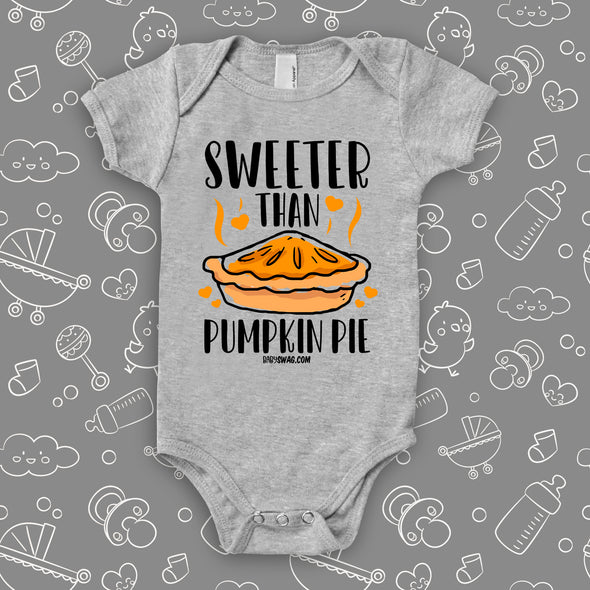 Cute baby onesies with saying "Sweeter Than Pumpkin Pie" in grey. 