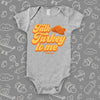 Hillarious baby onesies with saying "Talk Turkey To Me" in grey.
