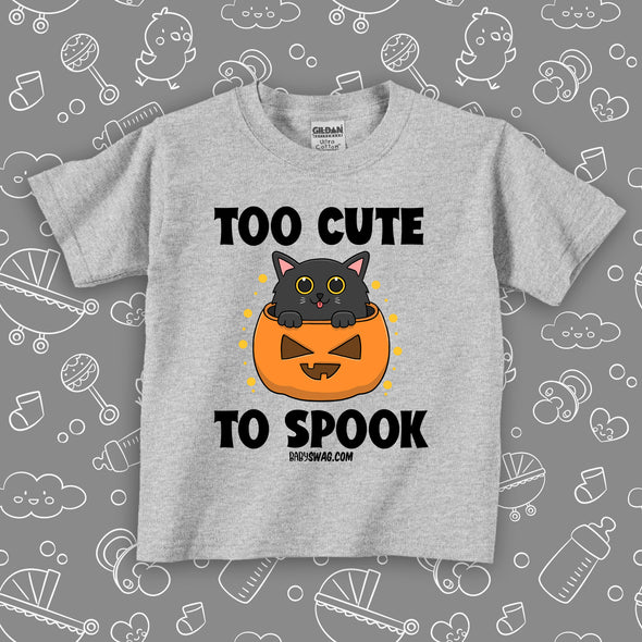 Toddler graphic tees with saying "Too Cute To Spook" in grey. 