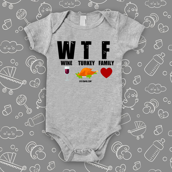 Cute baby onesies with saying "WTF Wine Turkey Family" in grey.
