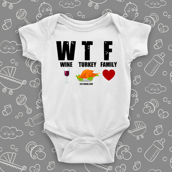 Cute baby onesies with saying "WTF Wine Turkey Family" in white.