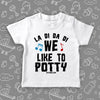 Cute toddler shirt with saying "We Like To Potty" in white.
